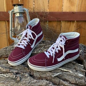 Vans burgundy high tops.